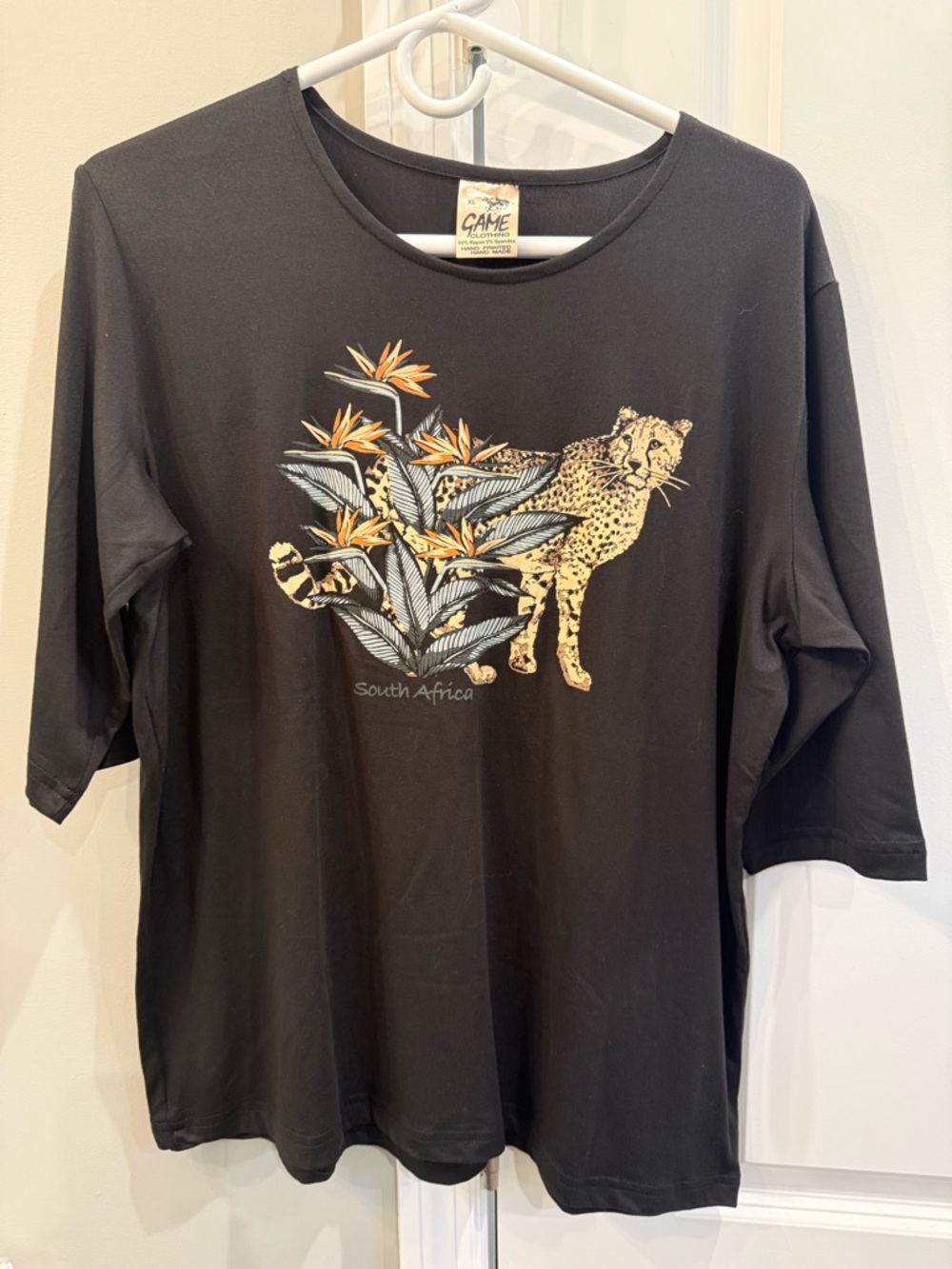 Black Graphic Tee with Leopard & Birds of Paradise
